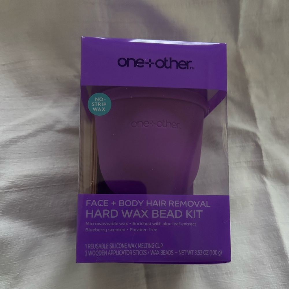 One Other brand face and body hair removal wax kit.